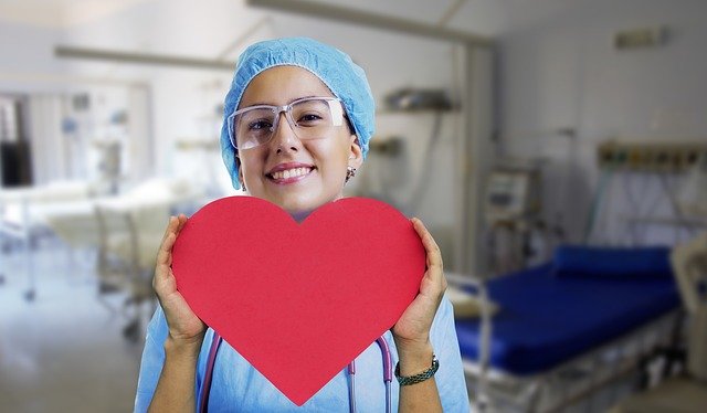 Doctor Holding Heart Shape